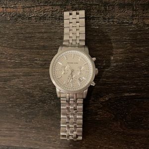 Gently used Michael Kors Men’s/Unisex watch.